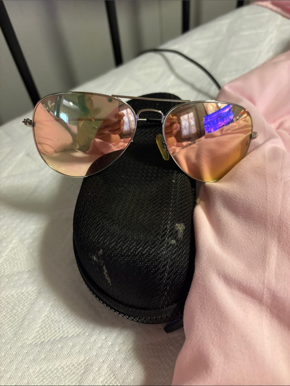 Ray Ban Sunglasses with light pink frames and shilver lenses